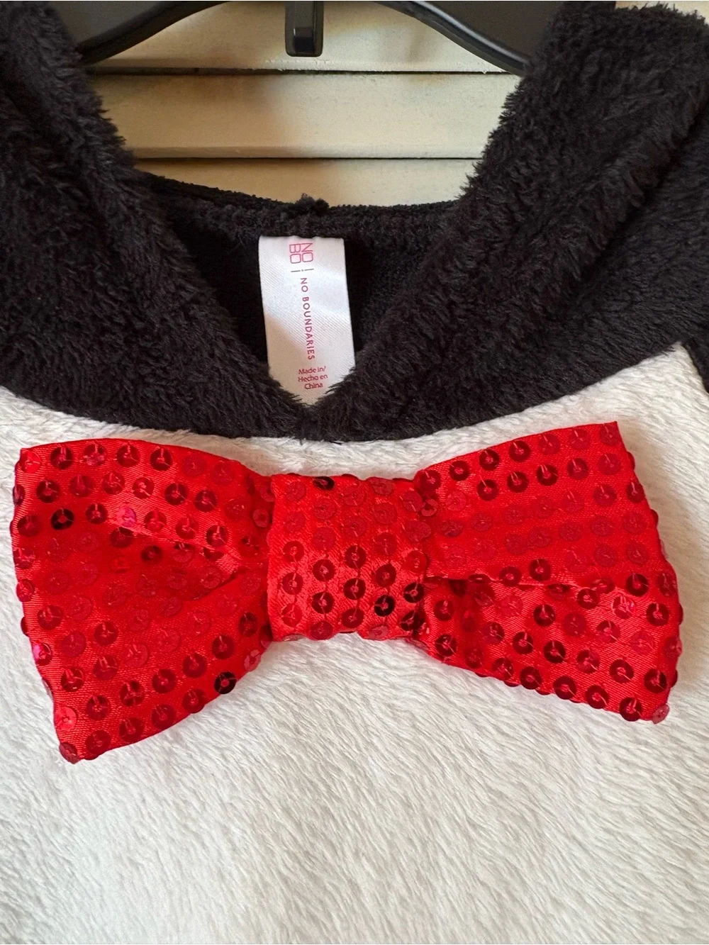 No Boundaries Black Fuzzy Hoodie with red bow.  Fits like a Woman Large